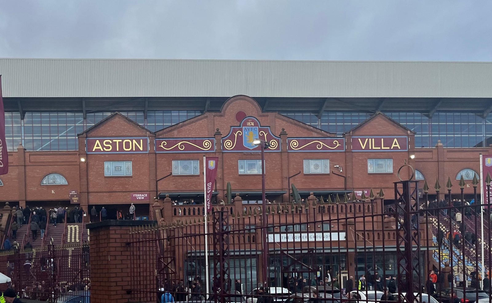 Villa Park exterior and Aston Villa supporters on matchday in Birmingham