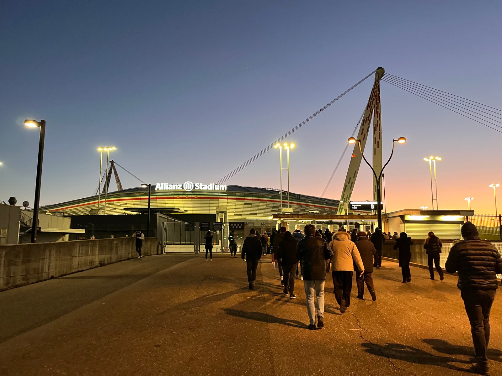 Allianz Stadium and Juventus supporters in Turin