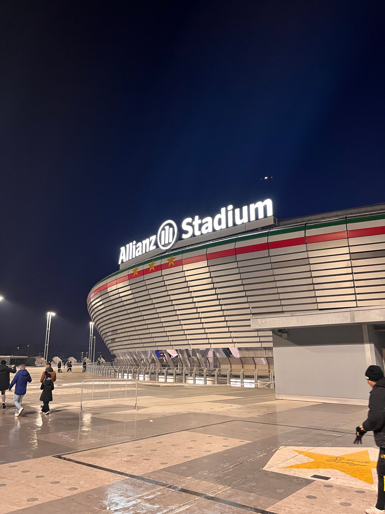 Allianz Stadium exterior and Juventus supporters in Turin on matchday